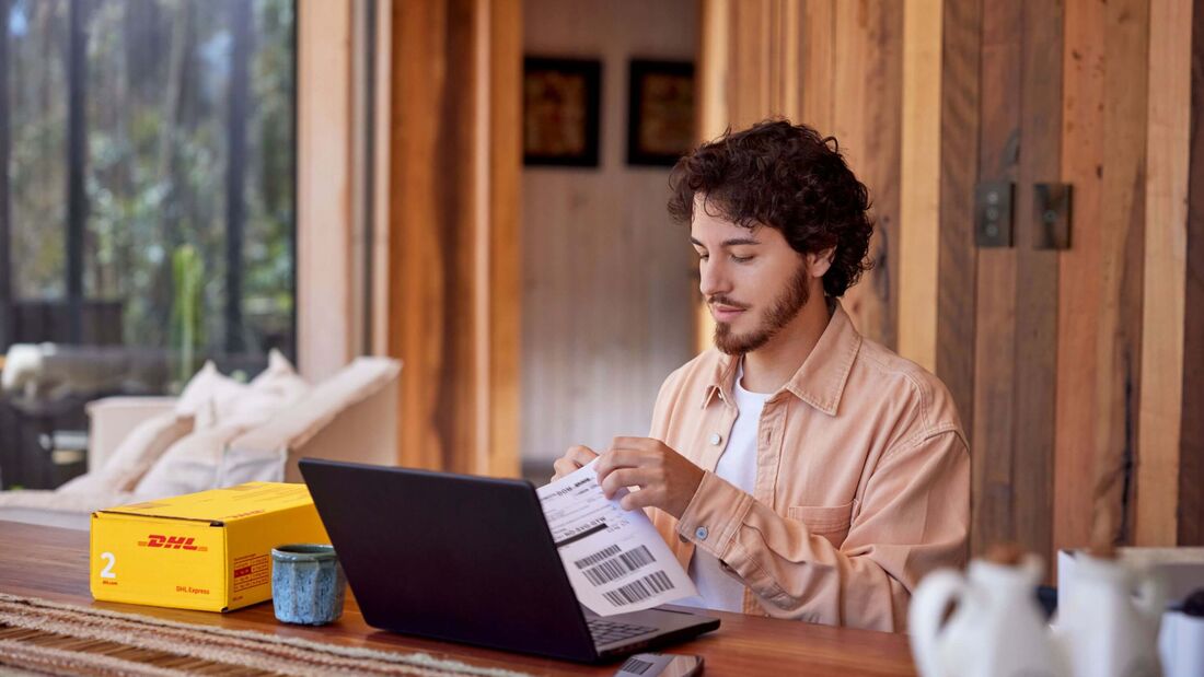 DHL Group kooperiert mit Shopify