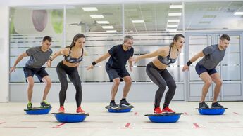 Exercising on bosu ball