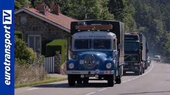 Historische Lkw fahren in Kolonne auf einer Landstraße – Teaserbild zur Benelux-Tour mit eurotransportTV-Logo.