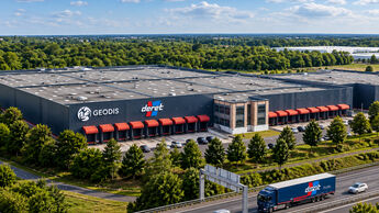 KI-Montage eines Deret-Logistikzentrums mit Geodis- und Deret-Schriftzügen zur geplanten Übernahme in Frankreich.