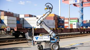 Mobiler Roboter zur Automatisierung des Umsetzens von Pins auf Containertragwagen am HHLA Container Terminal Tollerort.
