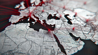 Network connections map over the Middle East and Europe, representing business connections, transportation, or global relations with a dark background.. A close-up of a world map with migration routes drawn in red lines in the foreground, map textures sha