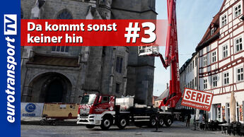 Roter MAN TGS mit ausgefahrener Arbeitsbühne neben einem historischen Kirchturm in Nördlingen. Zu sehen sind das eurotransportTV-Logo, der Serienstempel sowie der Thumbnail-Text „Da kommt sonst keiner hin #3“.