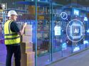 Smart logistics worker manages warehouse operations with AI technology, using digital tools for inventory tracking, automation, and efficient supply chain control.