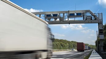 Truck toll system, german highway - control gantry, motion blur on truck