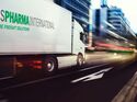 White,Truck,Moving,Fast,On,The,Road,In,A,Modern