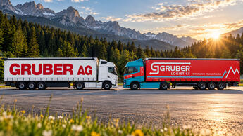 Zwei Lkw von Gruber Logistics und der Hamburger Gruber AG stehen sich frontal gegenüber. Das Motiv symbolisiert die Wiedervereinigung der beiden Unternehmen nach fast 30 Jahren.